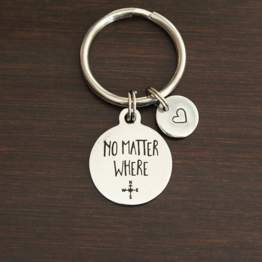 stainless steel engraved keychain with saying no matter where and basic compass on it